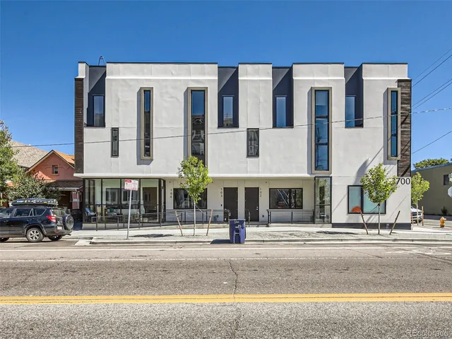 a front view of a house with a garage