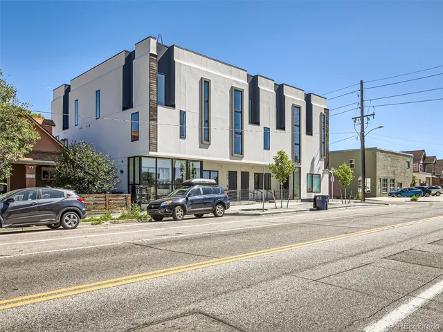a view of a building with a street