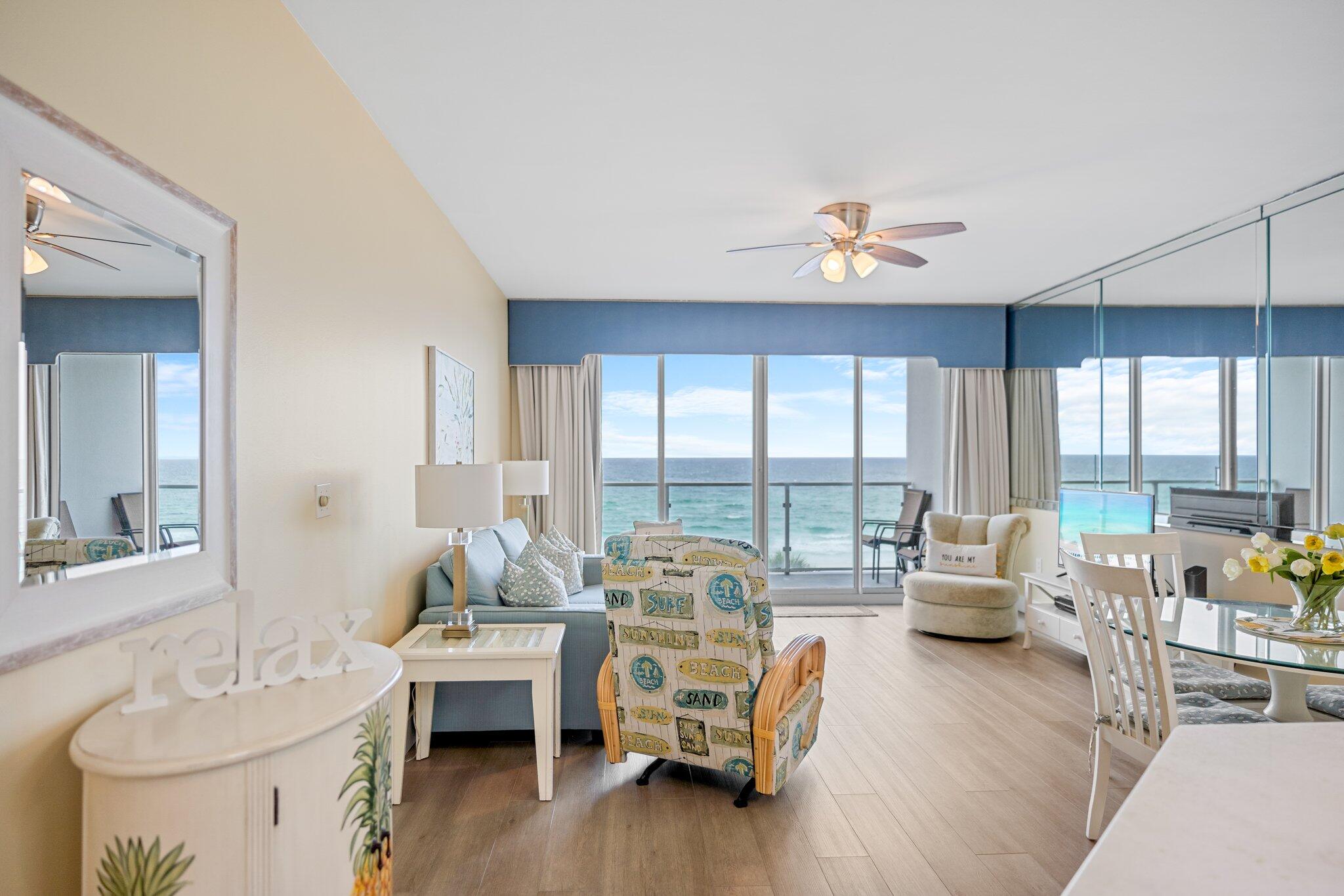 1080 Highway 98, Unit 403 Destin, FL 32541 - Photo 19 of 65 a living room with furniture and a large window