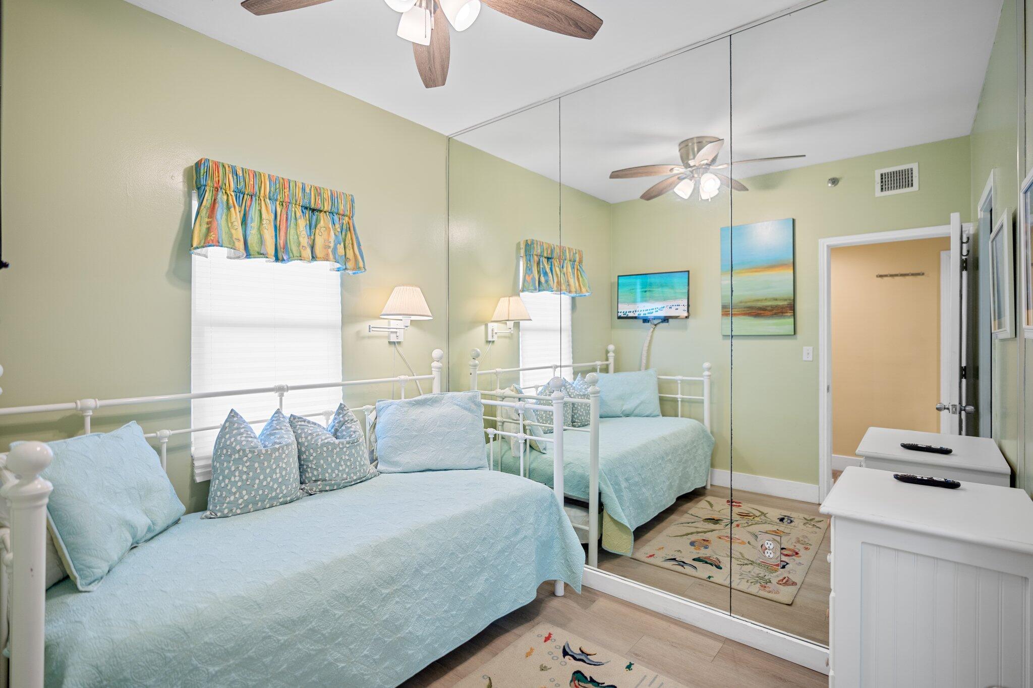 1080 Highway 98, Unit 403 Destin, FL 32541 - Photo 27 of 65 a living room with furniture and a chandelier
