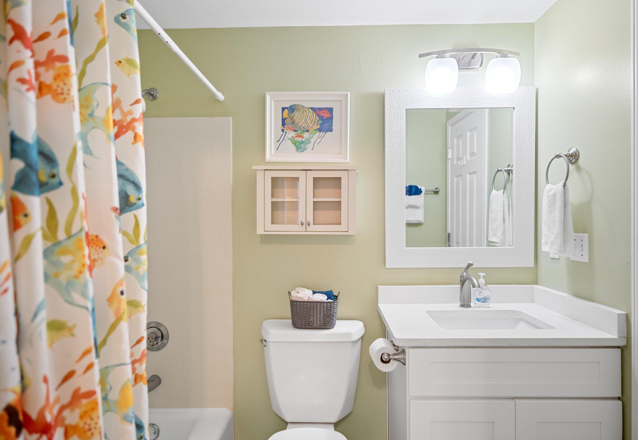 1080 Highway 98, Unit 403 Destin, FL 32541 - Photo 29 of 65 a bathroom with a sink and a mirror
