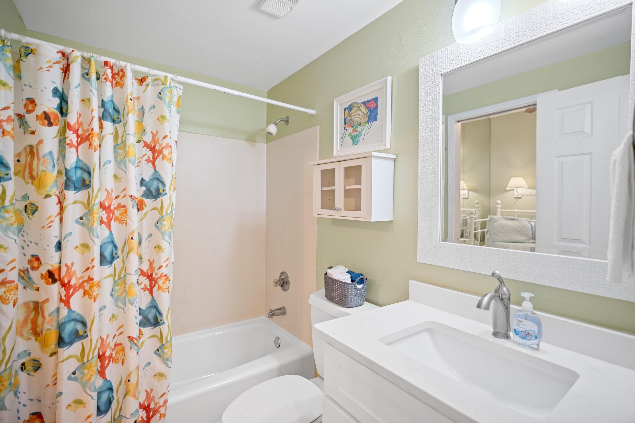 1080 Highway 98, Unit 403 Destin, FL 32541 - Photo 30 of 65 a bathroom with a sink toilet and shower