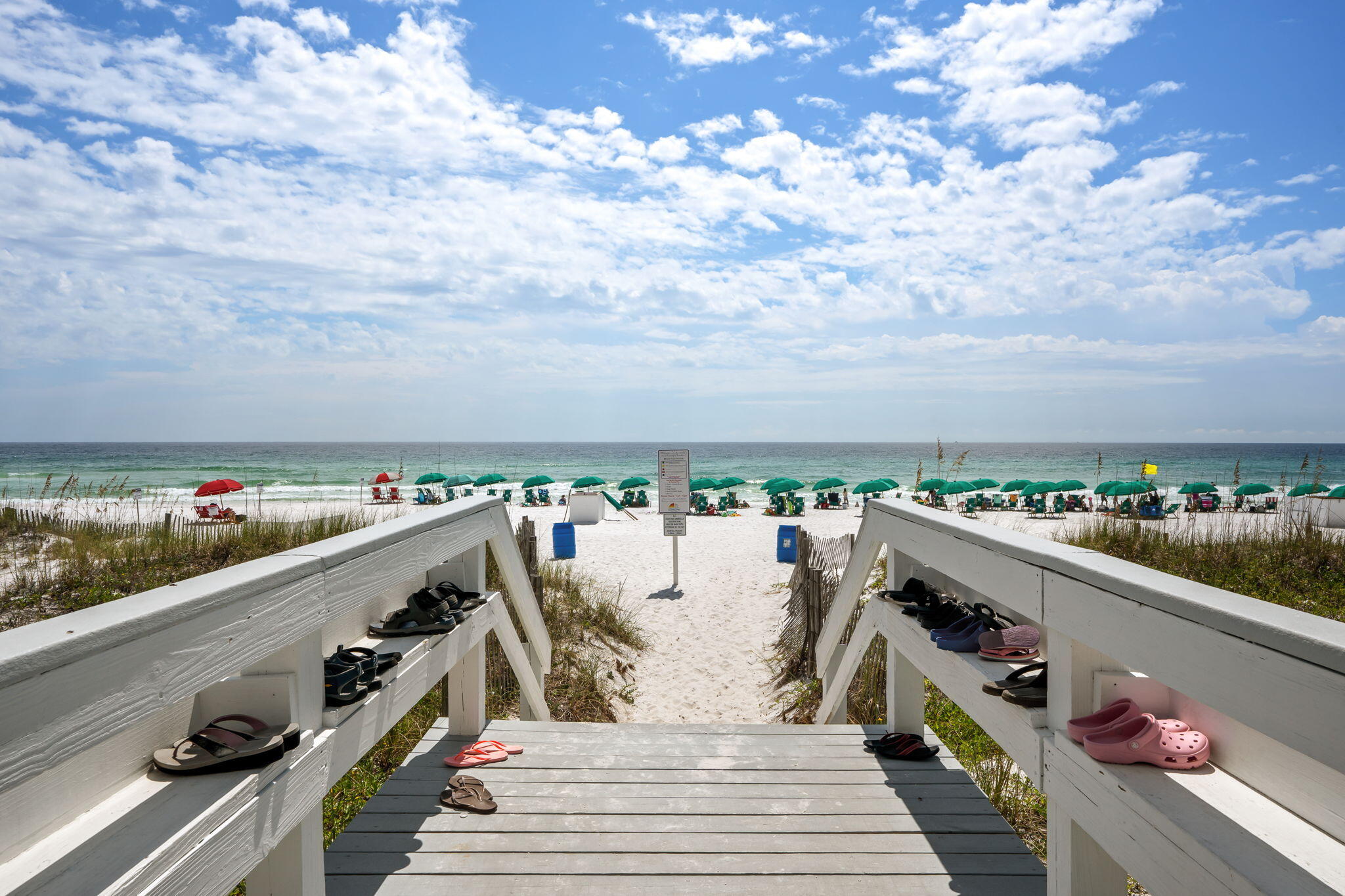 1080 Highway 98, Unit 403 Destin, FL 32541 - Photo 36 of 65 a view of roof with two chairs and potted plants