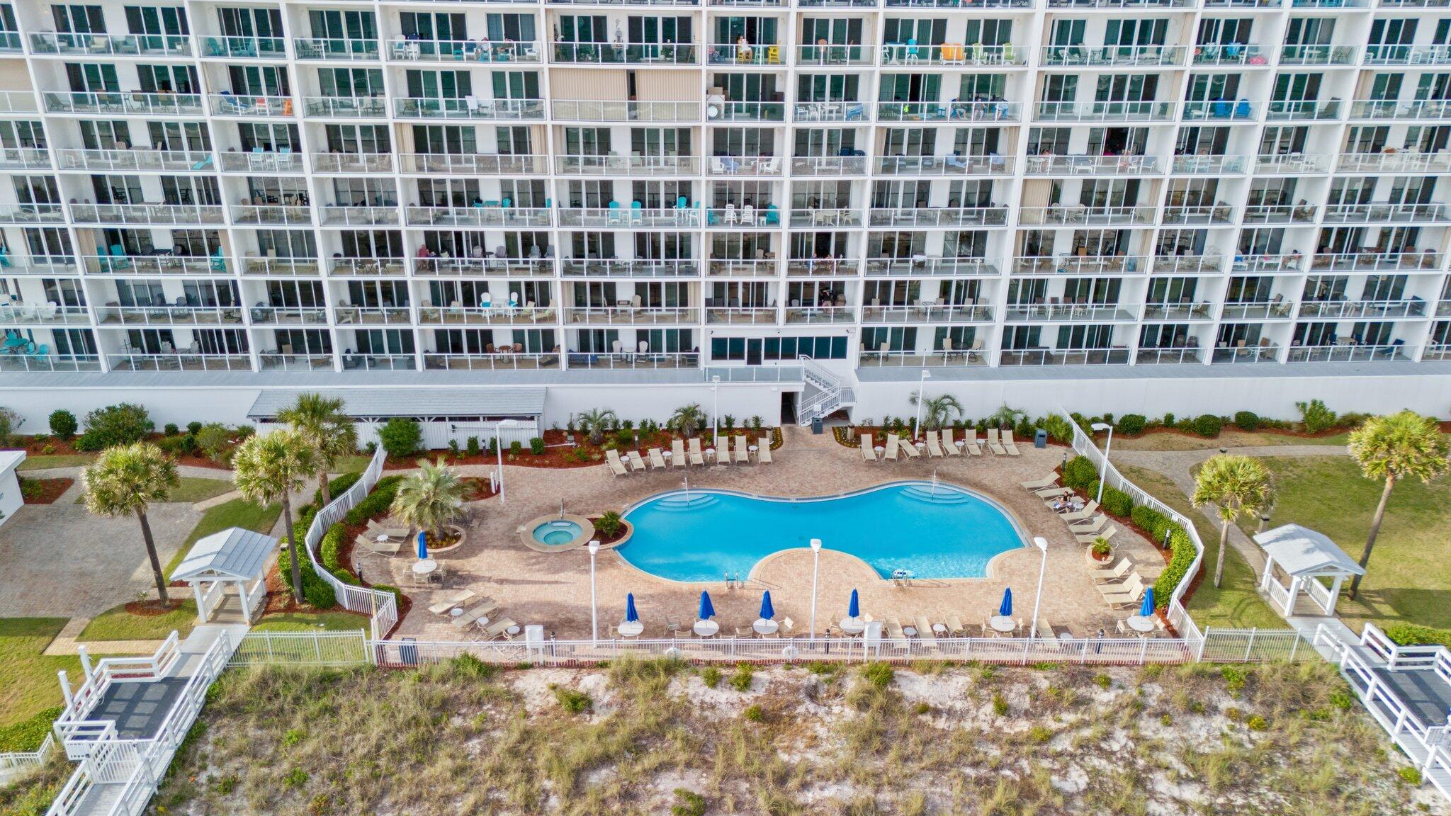 1080 Highway 98, Unit 403 Destin, FL 32541 - Photo 41 of 65 a view of a swimming pool with outdoor seating
