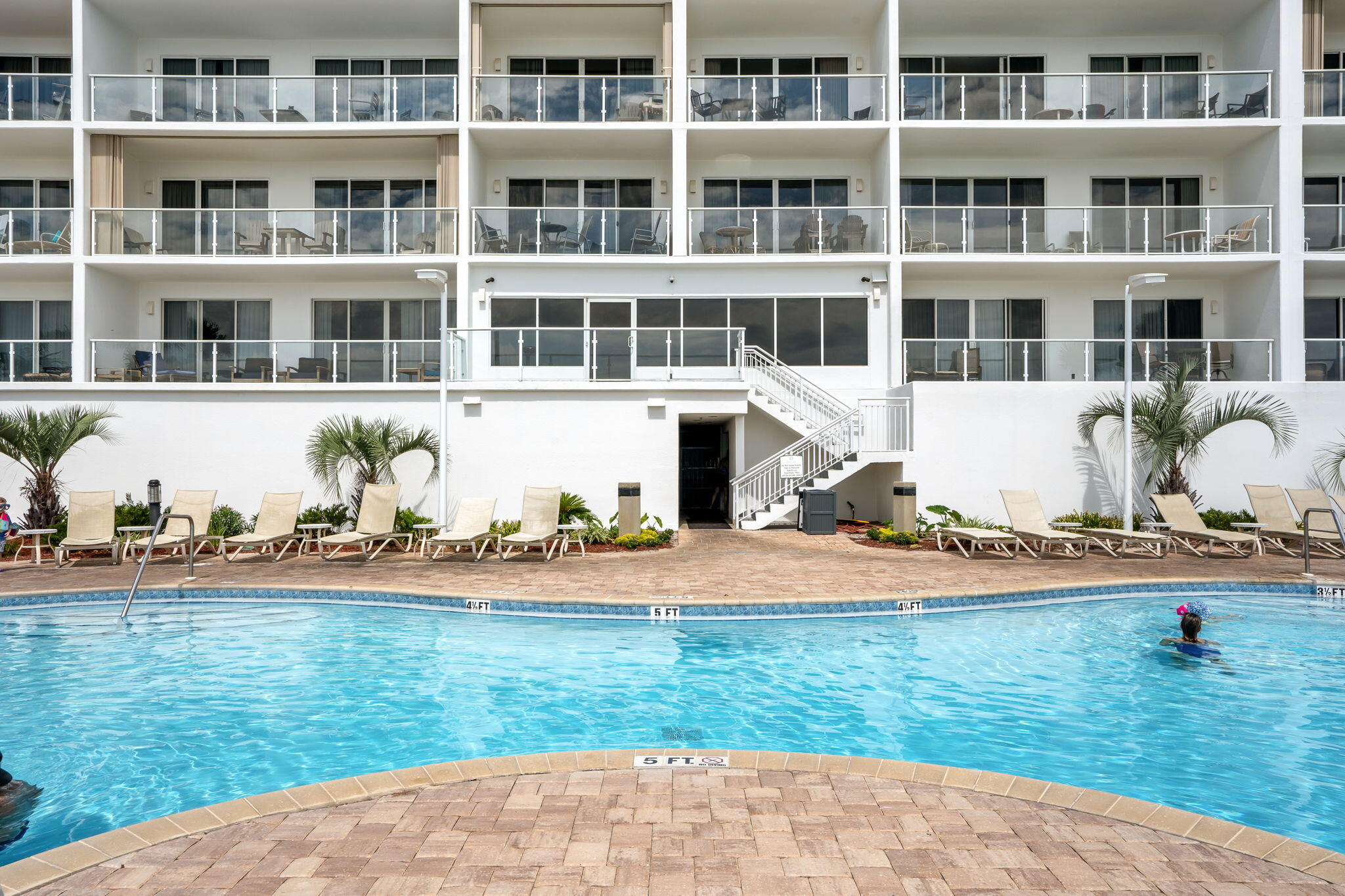 1080 Highway 98, Unit 403 Destin, FL 32541 - Photo 44 of 65 a front view of a house with a yard