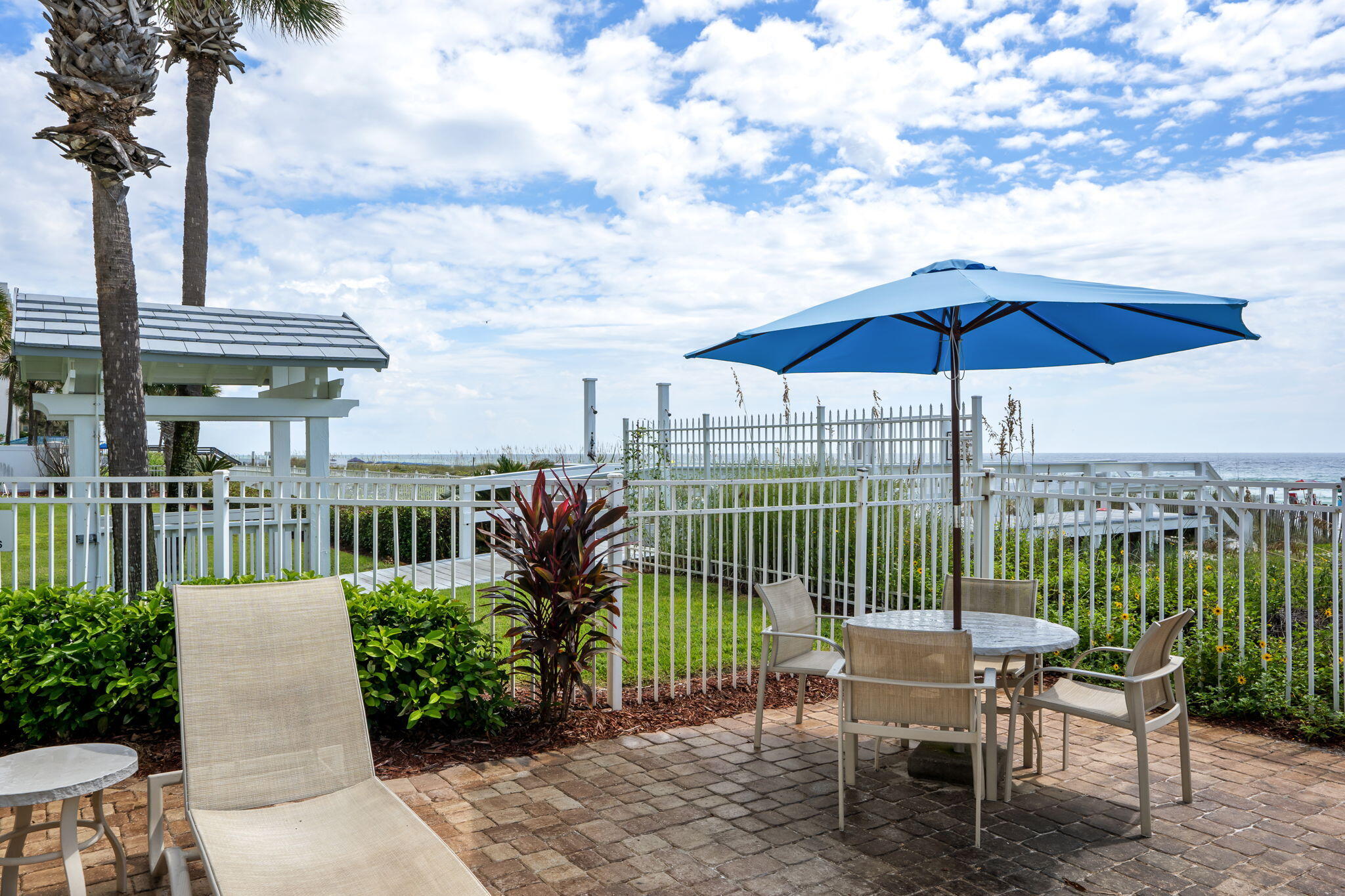 1080 Highway 98, Unit 403 Destin, FL 32541 - Photo 47 of 65 a view of a chair and table in the balcony