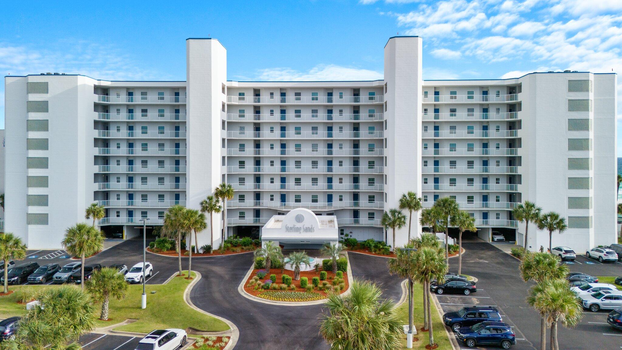 1080 Highway 98, Unit 403 Destin, FL 32541 - Photo 61 of 65 a front view of a building with outdoor seating