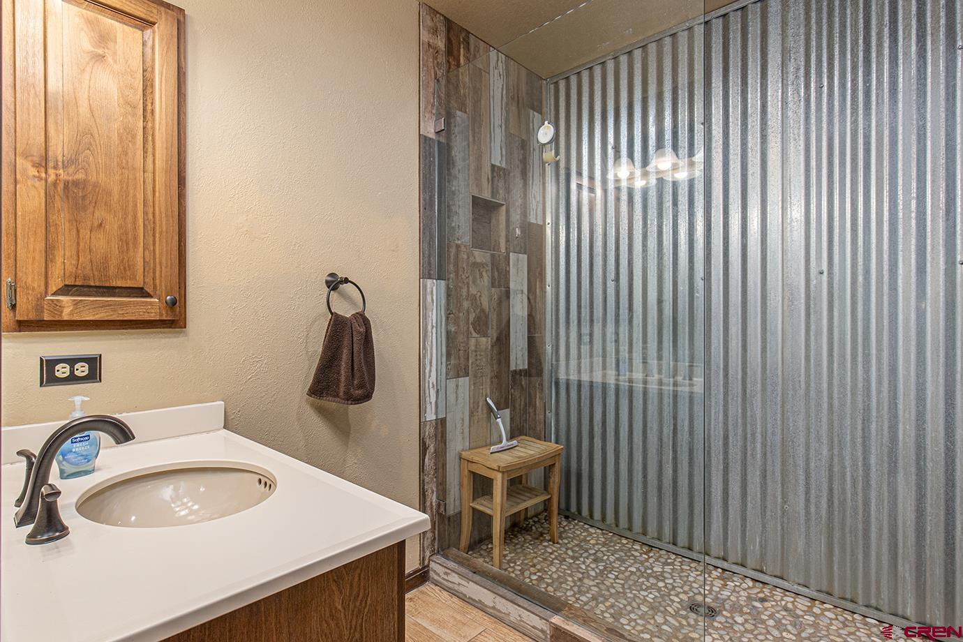 50827 Highway 550, Unit 330 Durango, CO 81301 - Photo 12 of 31 a bathroom with a sink and a mirror