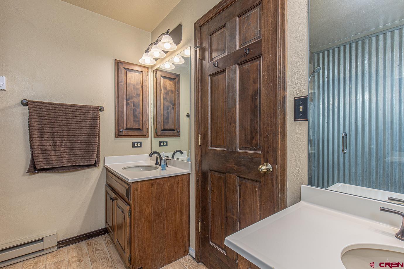 50827 Highway 550, Unit 330 Durango, CO 81301 - Photo 13 of 31 a bathroom with a sink and a mirror