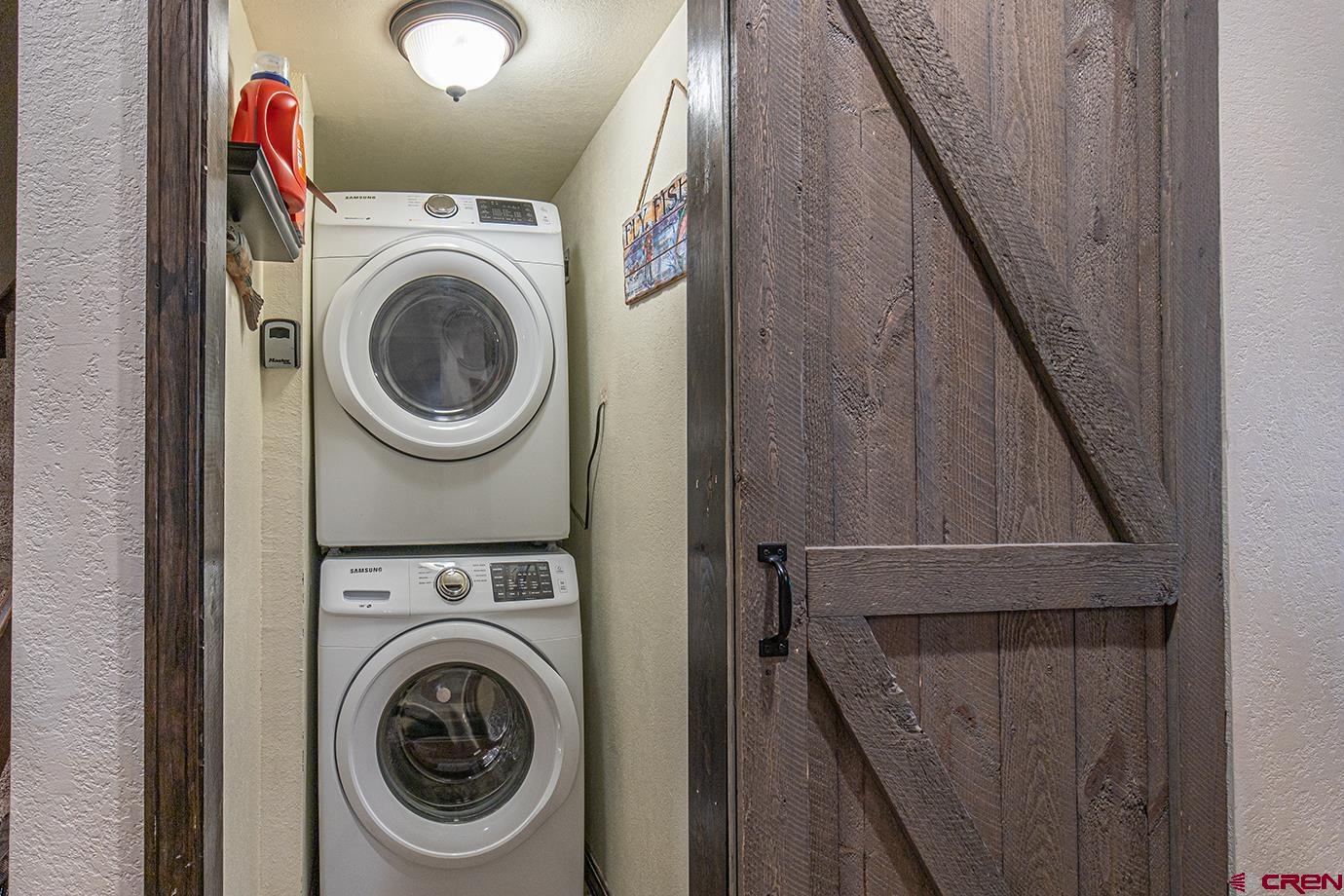 50827 Highway 550, Unit 330 Durango, CO 81301 - Photo 18 of 31 a utility room with dryer and washer