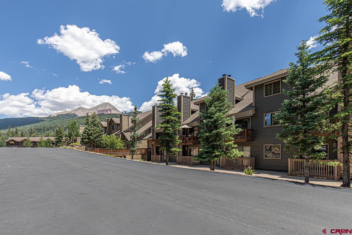 50827 Highway 550, Unit 330 Durango, CO 81301 - Photo 22 of 31 a view of a house with a flower garden