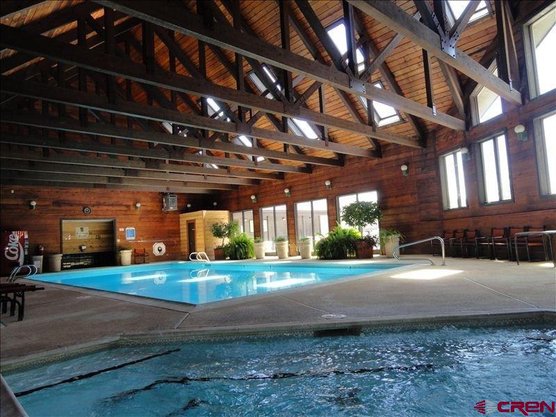 50827 Highway 550, Unit 330 Durango, CO 81301 - Photo 23 of 31 a front view of a building with a yard