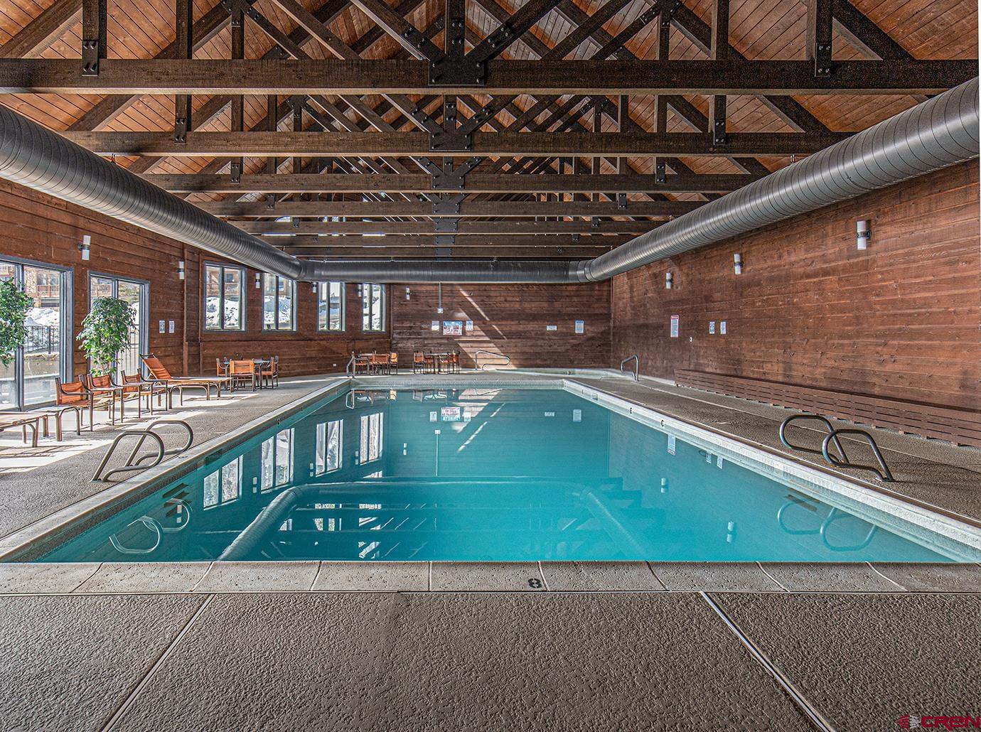 50827 Highway 550, Unit 330 Durango, CO 81301 - Photo 25 of 31 a view of a swimming pool with a patio