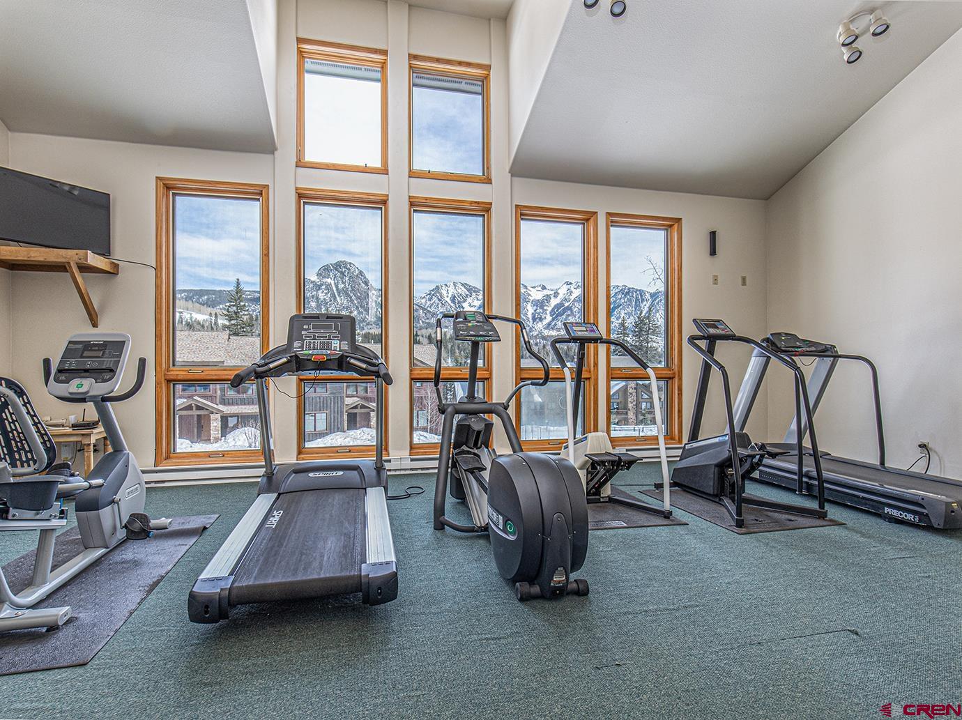 50827 Highway 550, Unit 330 Durango, CO 81301 - Photo 31 of 31 a living room with furniture and a floor to ceiling window