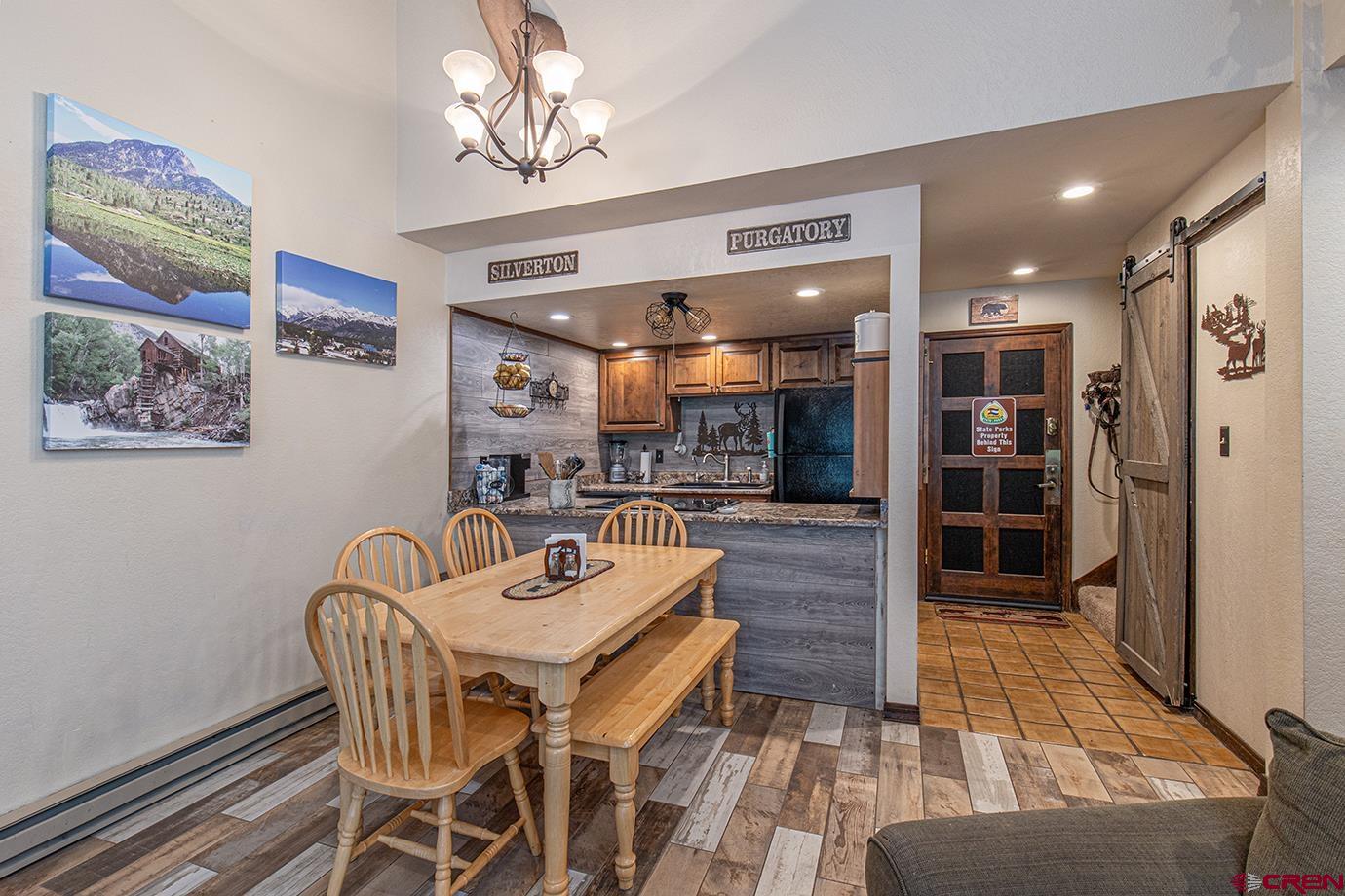 50827 Highway 550, Unit 330 Durango, CO 81301 - Photo 4 of 31 a dining room with furniture and window