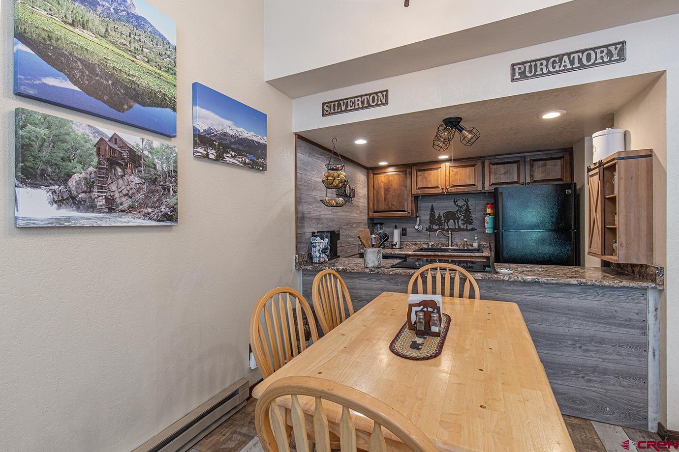50827 Highway 550, Unit 330 Durango, CO 81301 - Photo 7 of 31 a bedroom with furniture and a large window