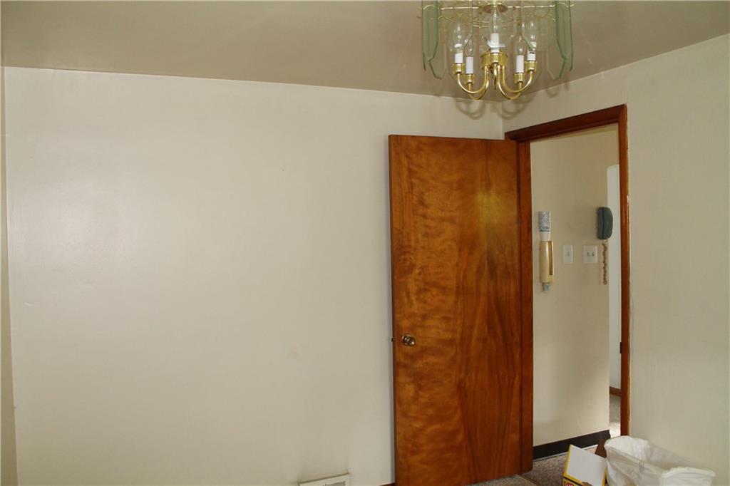 104 KIngs Road Braddock Hills, PA 15221 - Photo 11 of 23 Off the kitchen is the dining room. Current owner used as a 3rd bedroom.