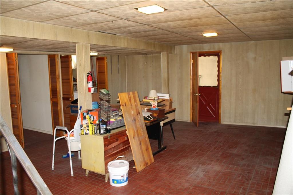 104 KIngs Road Braddock Hills, PA 15221 - Photo 19 of 23 Basement has a door to the garage, has a laundry room and full bathroom.