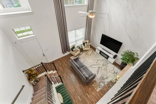 a view of a bedroom with furniture