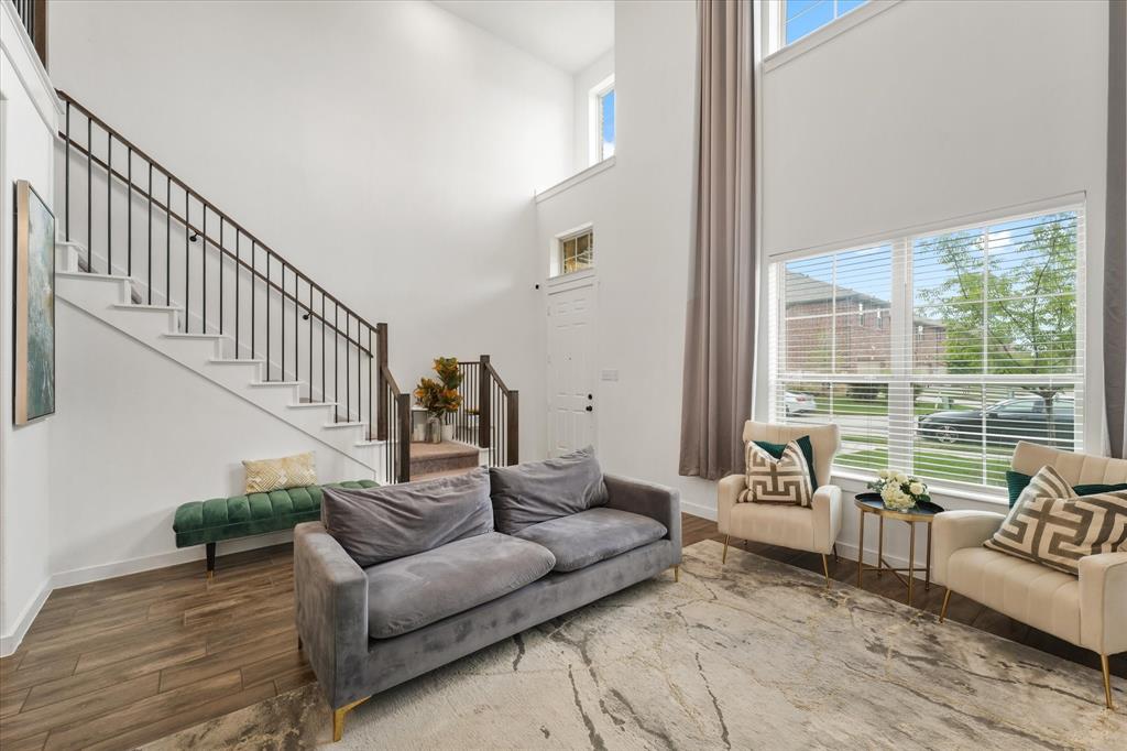 5824 Ridgeline Drive McKinney, TX 75070 - Photo 7 of 31 a living room with furniture and a large window with outer view