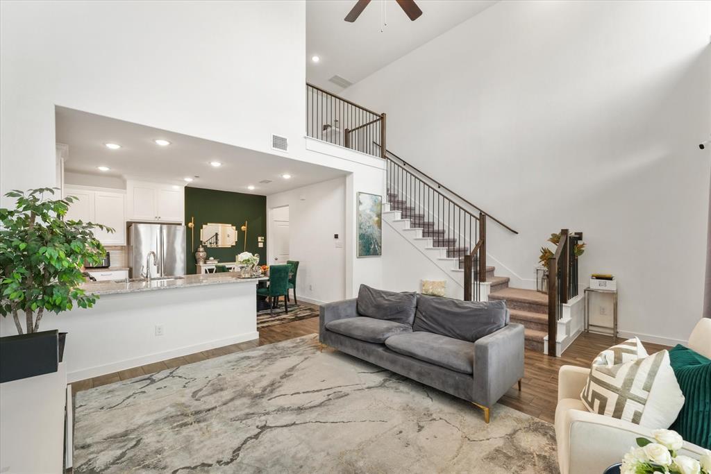 5824 Ridgeline Drive McKinney, TX 75070 - Photo 9 of 31 a living room with furniture and flowers