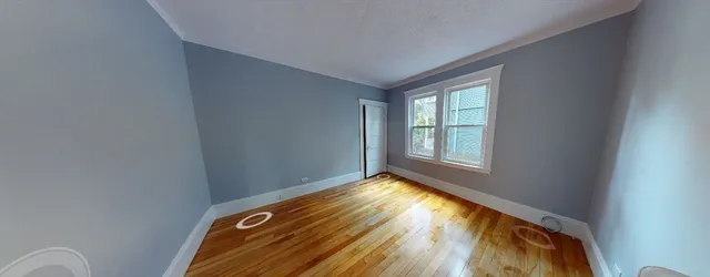 a view of an empty room and window