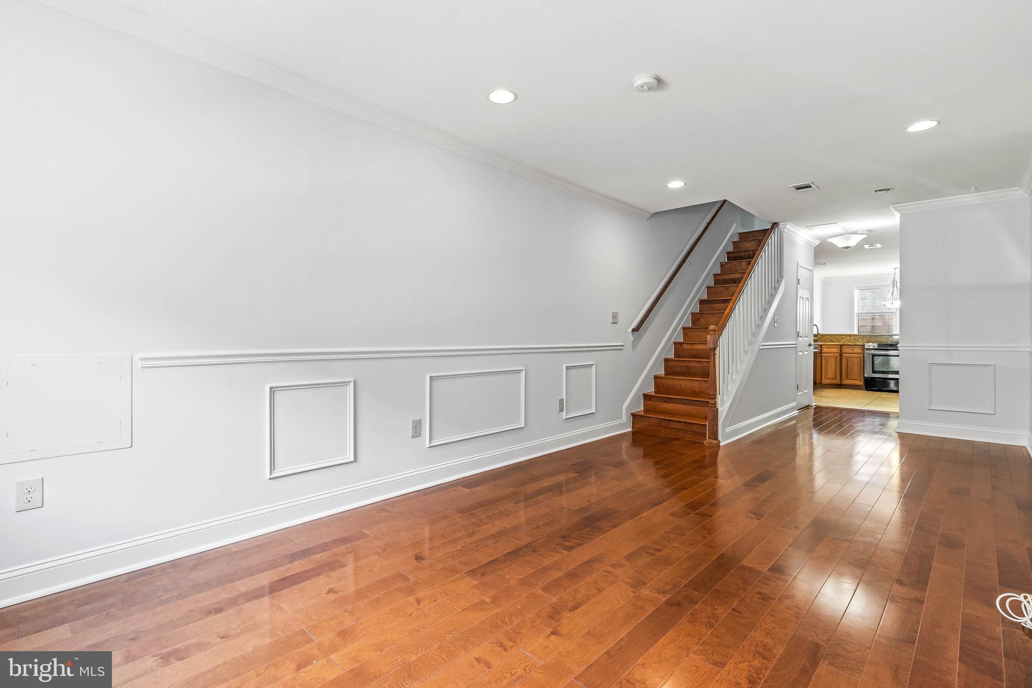 312 South Regester Street Baltimore, MD 21231 - Photo 3 of 48 Gleaming hardwood floors and new paint throughout