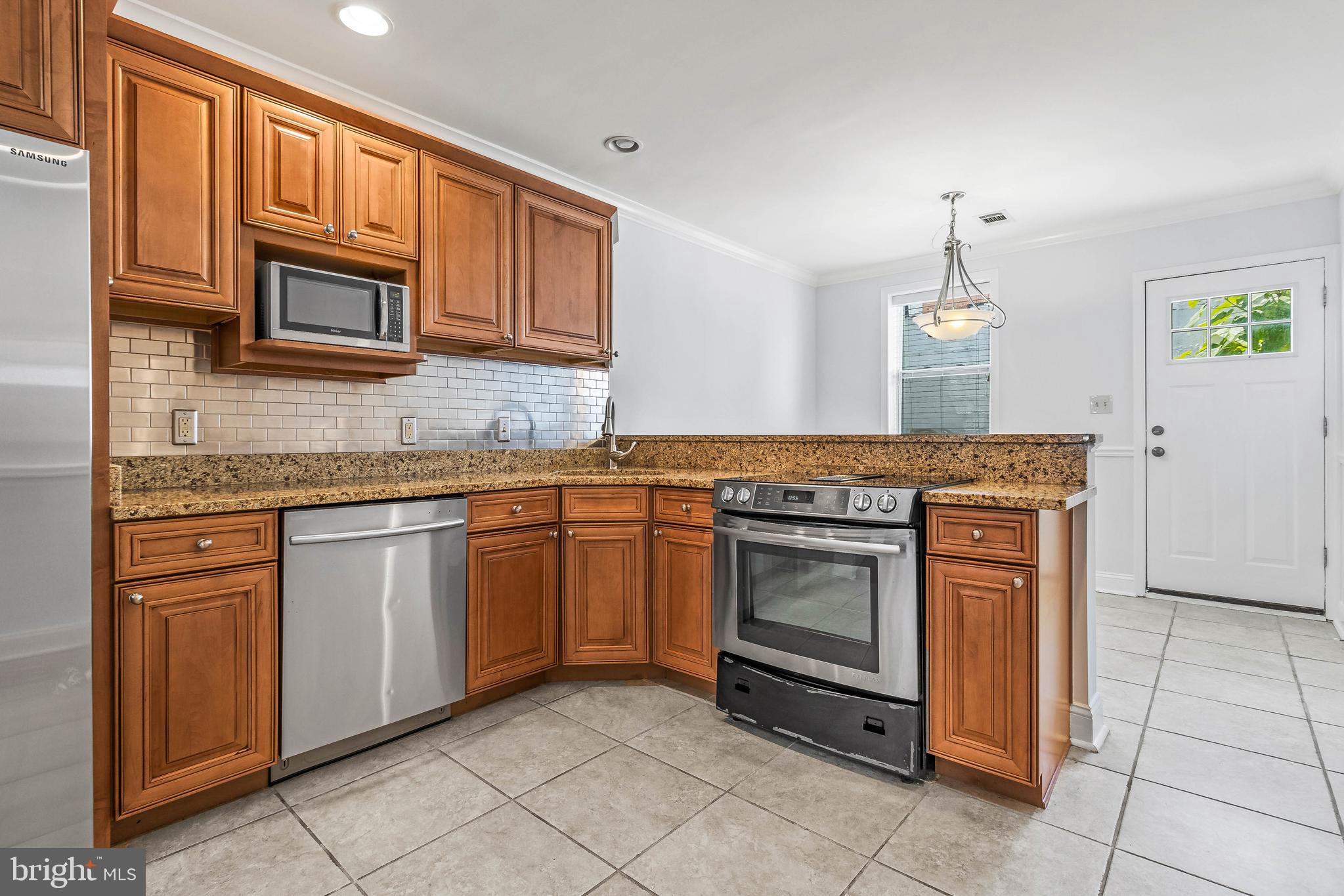 312 South Regester Street Baltimore, MD 21231 - Photo 7 of 48 Updated kitchen with granite counter tops