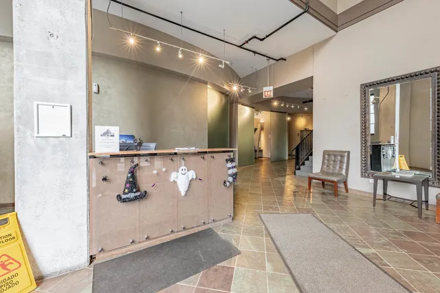 a view of a lobby with black and white walls