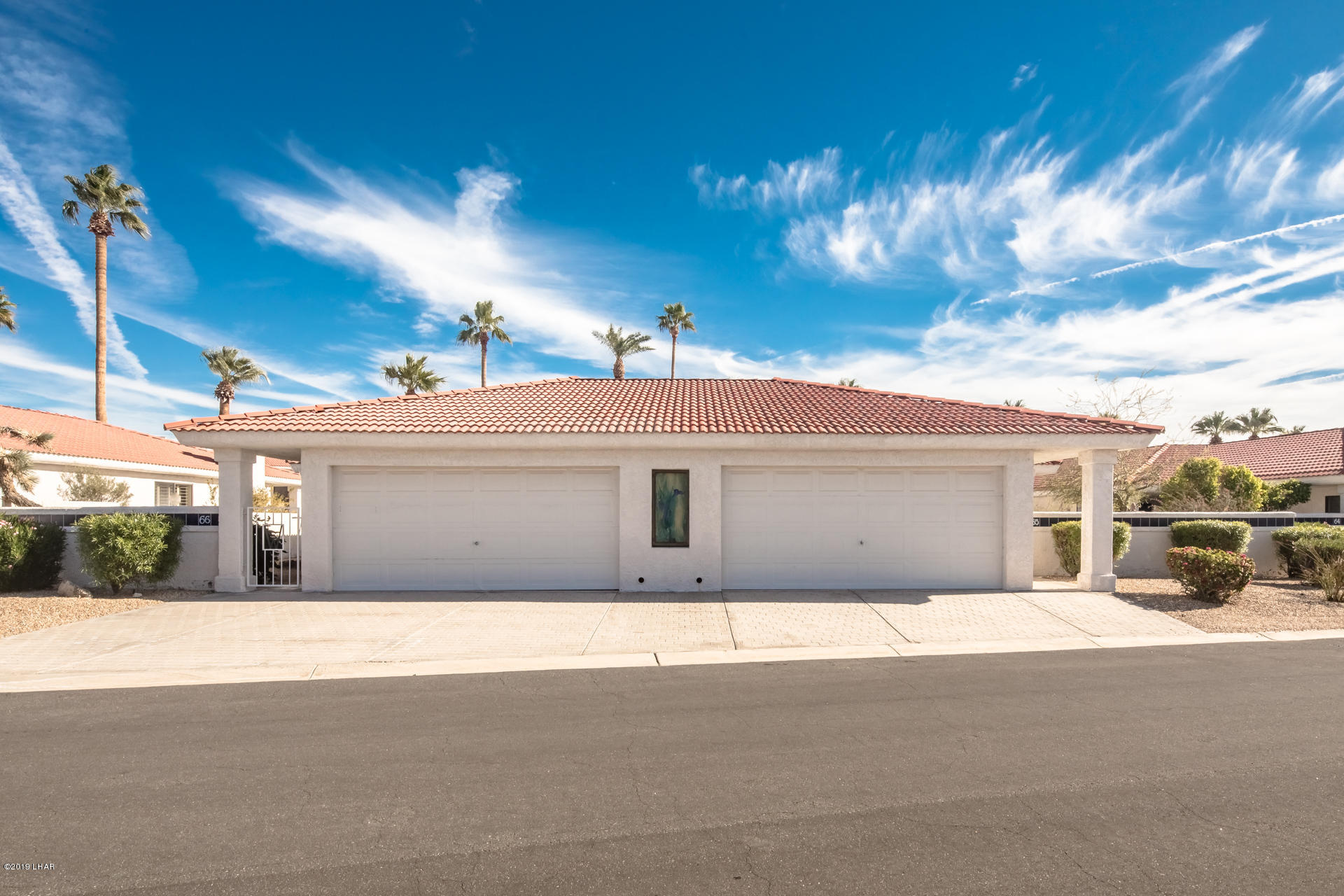 375 London Bridge Road, Unit 65 Lake Havasu City, AZ 86403 - Photo 1 of 35 3 Bedroom 2 Bath Condo in Gated Windsor Beach with a 14X30 Boat Deep Garage and 2 car garage.