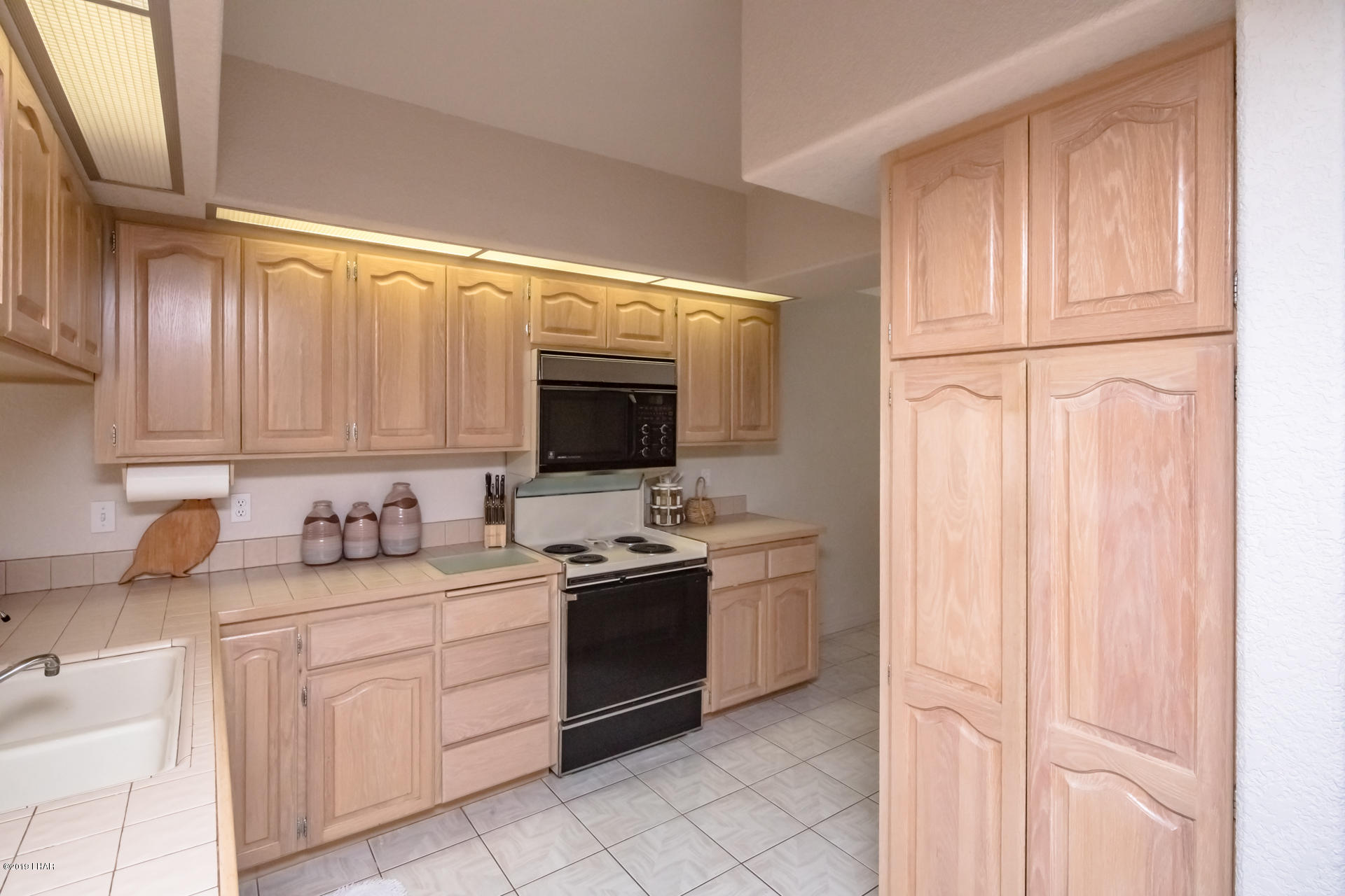 375 London Bridge Road, Unit 65 Lake Havasu City, AZ 86403 - Photo 13 of 35 Compact Kitchen with lots of storage.