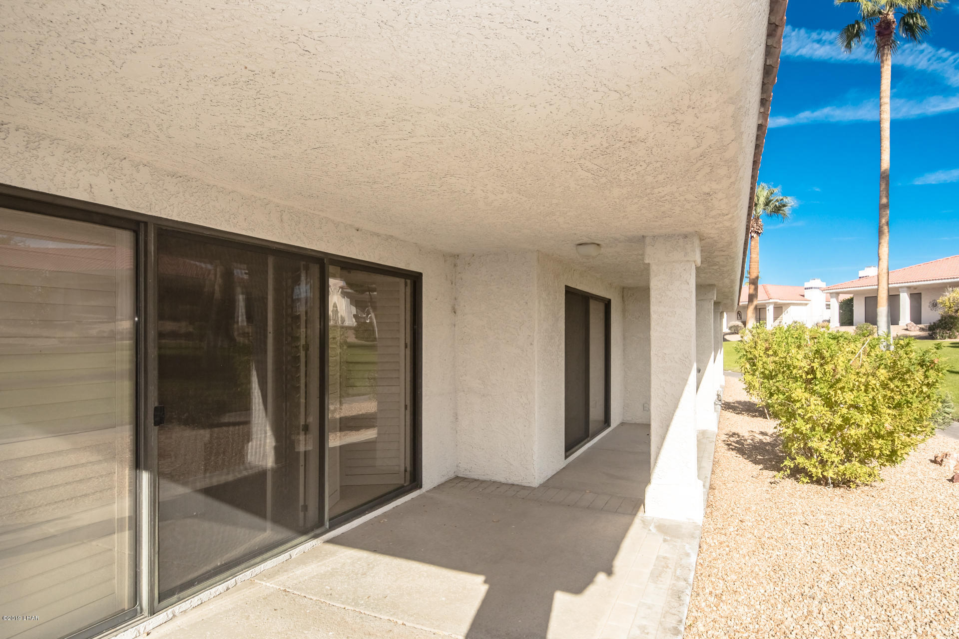 375 London Bridge Road, Unit 65 Lake Havasu City, AZ 86403 - Photo 25 of 35 Lots of Patio that face the greenbelt. Quiet area.