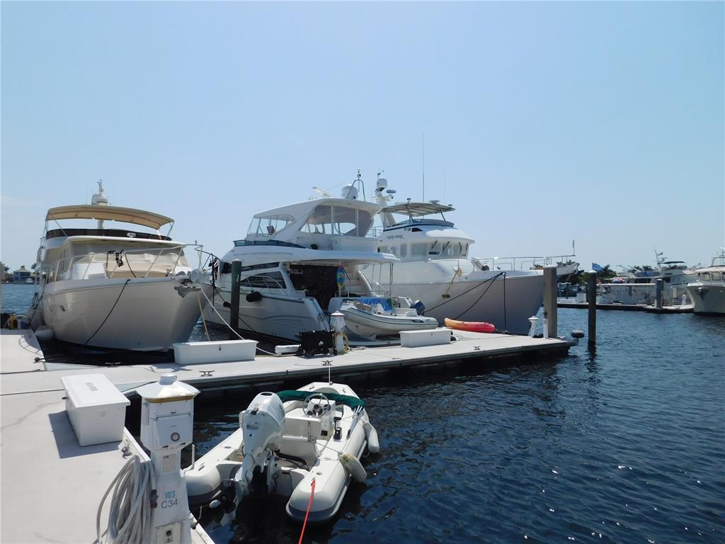 102 Riviera Dunes Way, Unit N60 Palmetto, FL 34221 - Photo 43 of 57 a living room with furniture and wooden floor