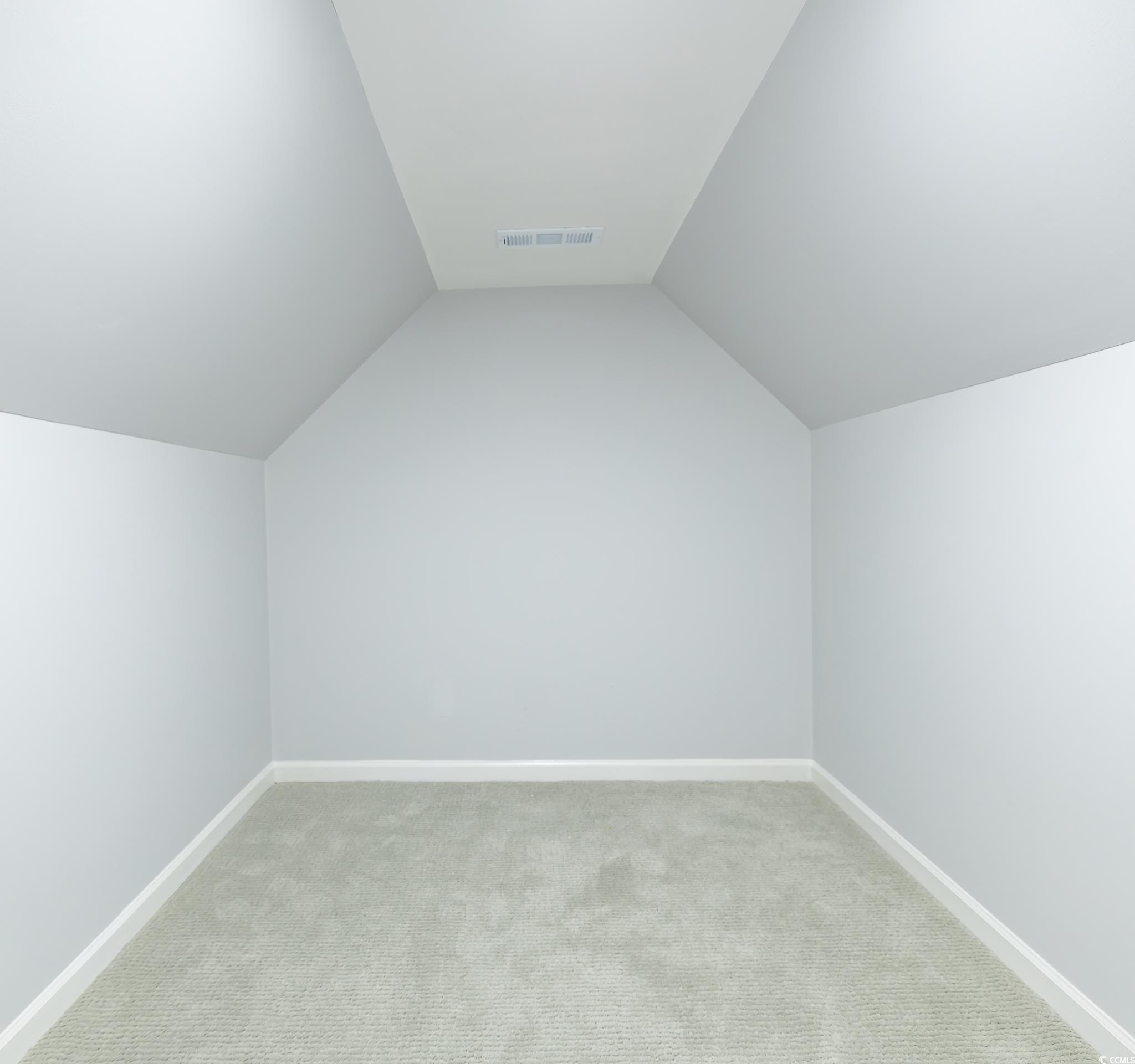 117 George Washington Trail Georgetown, SC 29440 - Photo 11 of 30 Bonus room featuring light carpet and vaulted ceiling