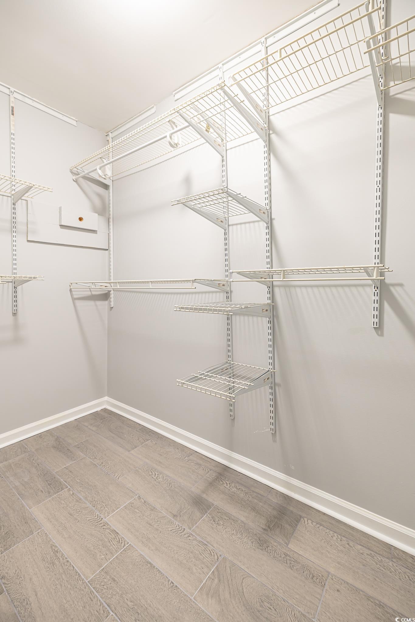 117 George Washington Trail Georgetown, SC 29440 - Photo 16 of 30 Spacious closet featuring hardwood / wood-style flooring