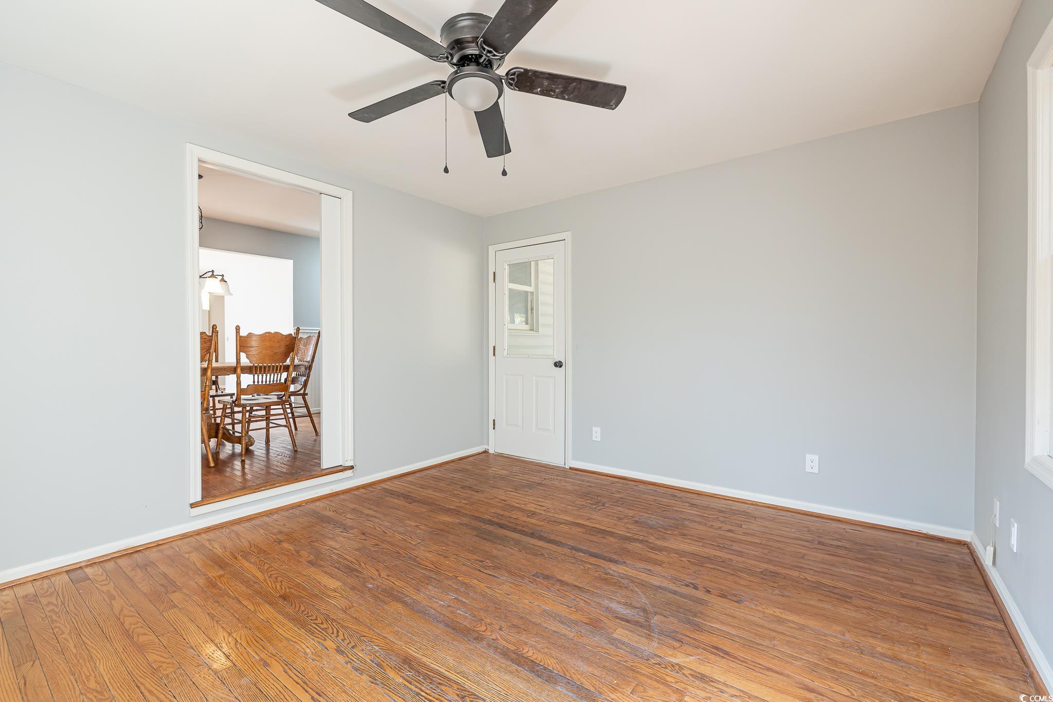 117 George Washington Trail Georgetown, SC 29440 - Photo 22 of 30 Spare room with ceiling fan and hardwood / wood-style floors