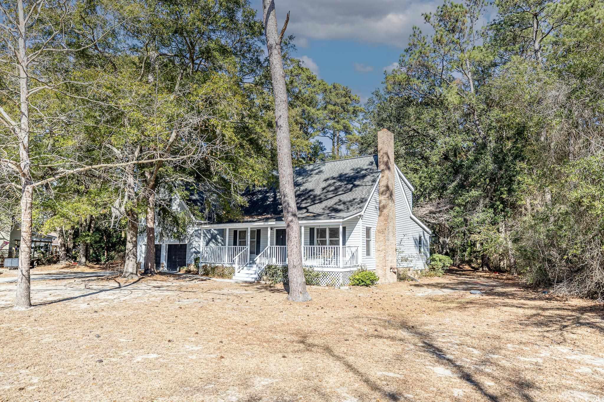 117 George Washington Trail Georgetown, SC 29440 - Photo 4 of 30 View of front of house featuring a porch
