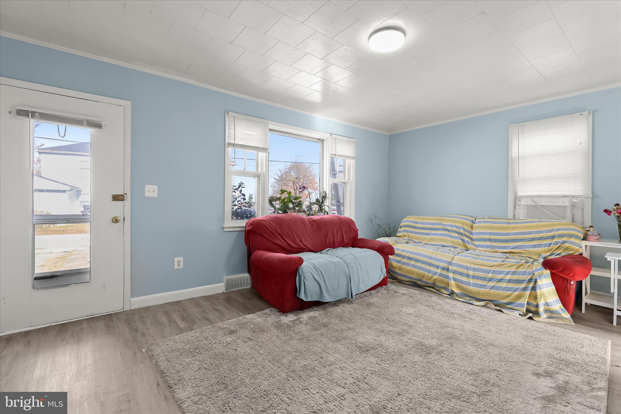 2813 Oak Grove Avenue Halethorpe, MD 21227 - Photo 2 of 43 a bedroom with bed and window