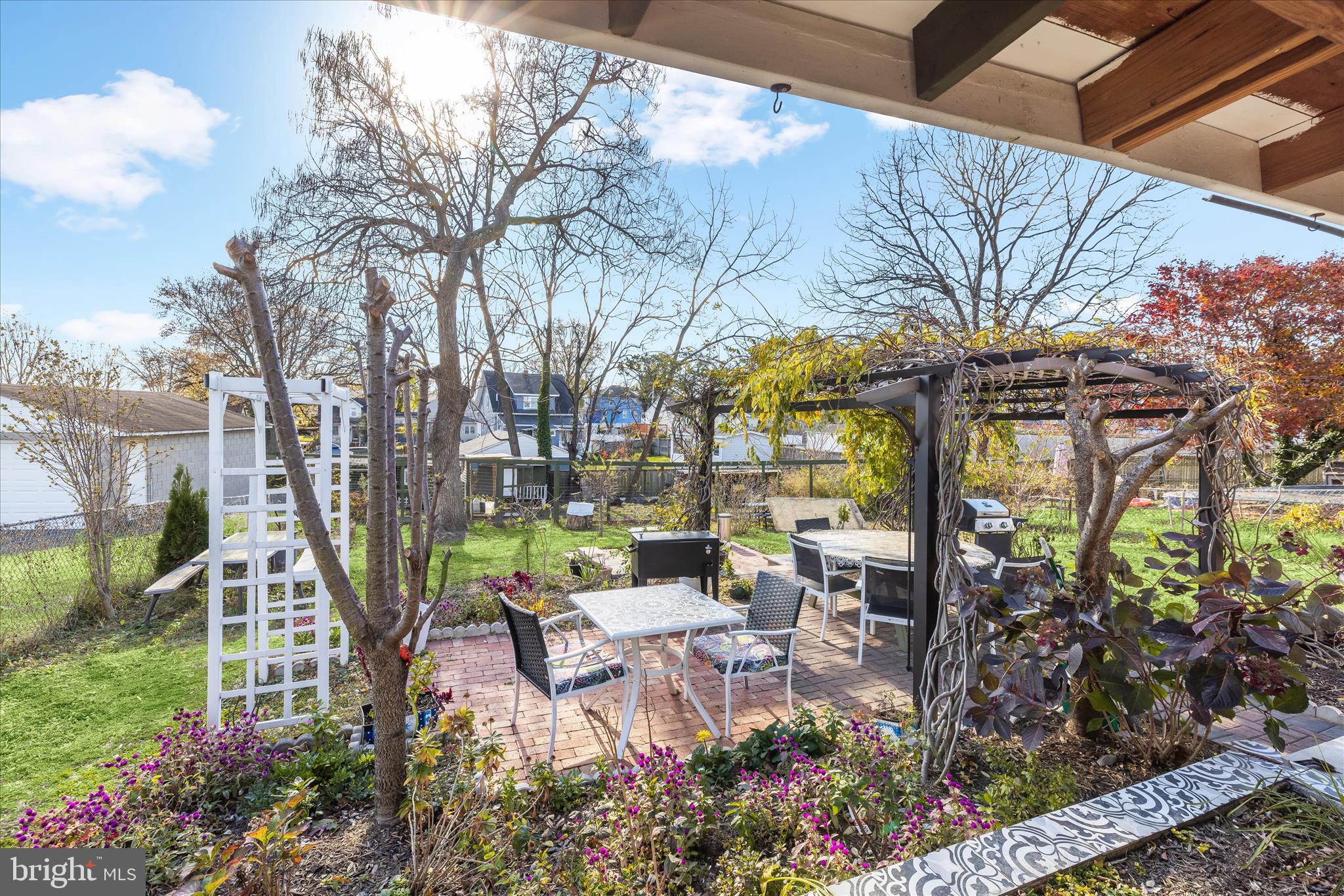 2813 Oak Grove Avenue Halethorpe, MD 21227 - Photo 28 of 43 a view of a patio with table and chairs and potted plants