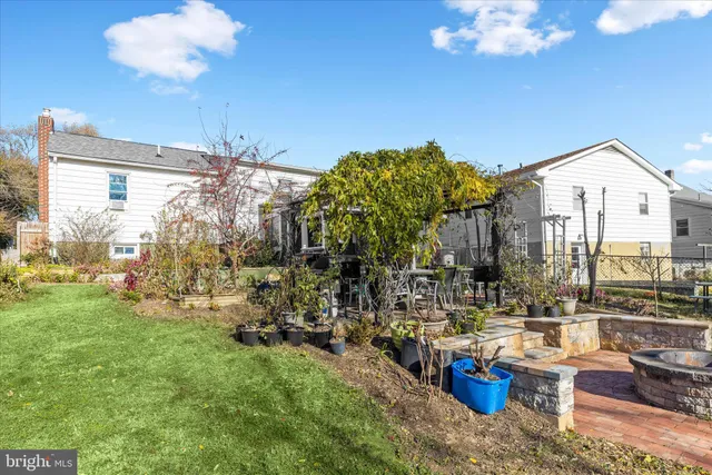 a view of a house with backyard porch and patio