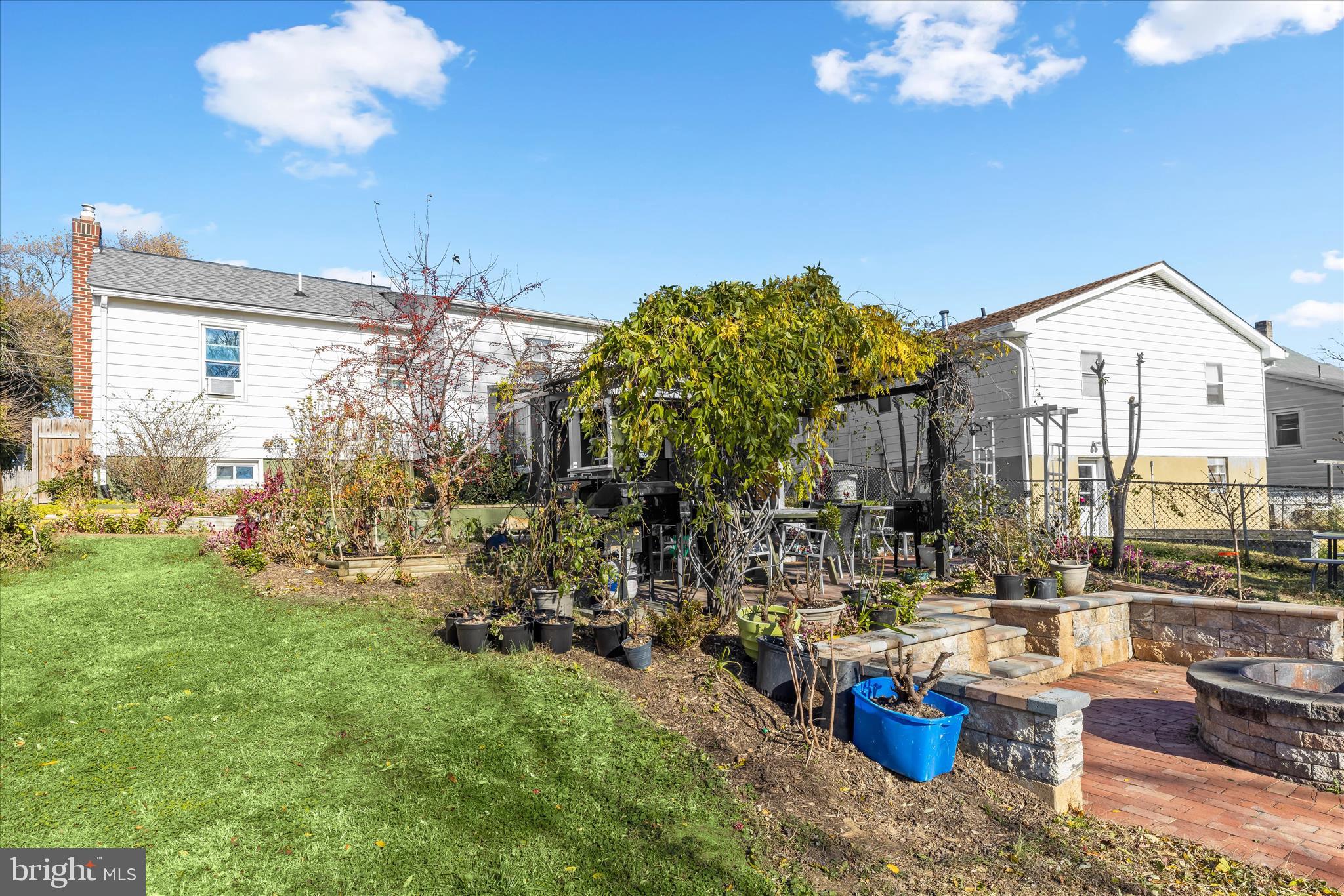 2813 Oak Grove Avenue Halethorpe, MD 21227 - Photo 35 of 43 a view of a house with backyard porch and patio