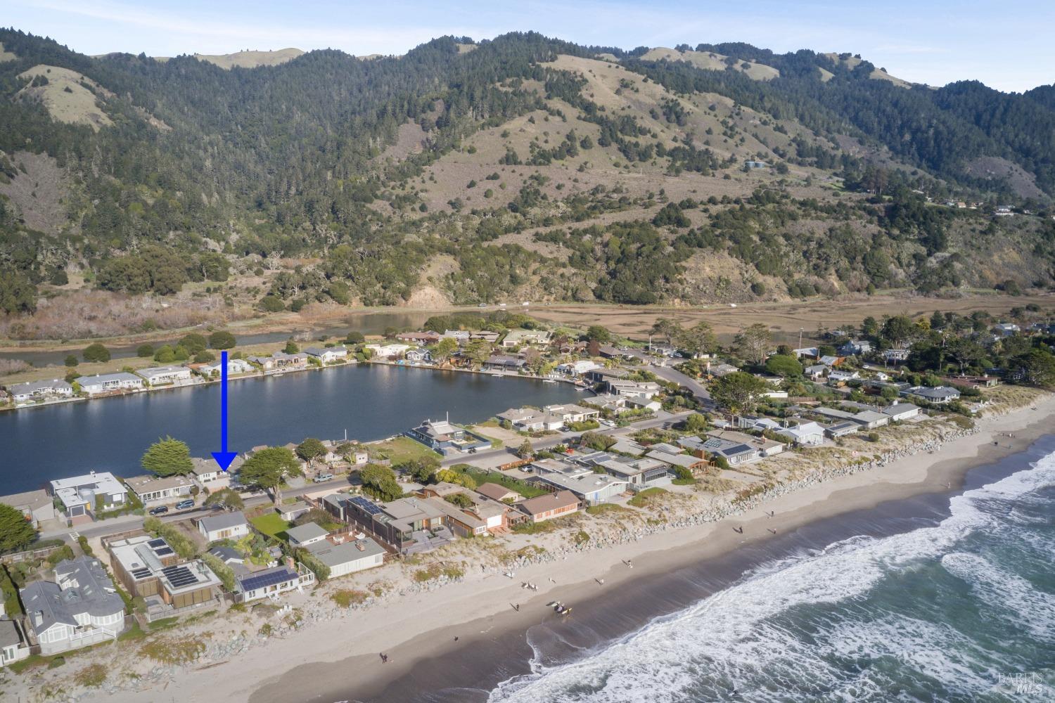 a view of a lake with a mountain in the background