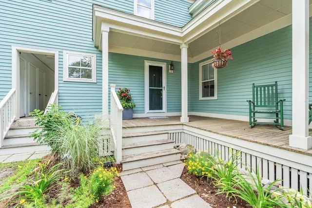 a front view of a house with a porch