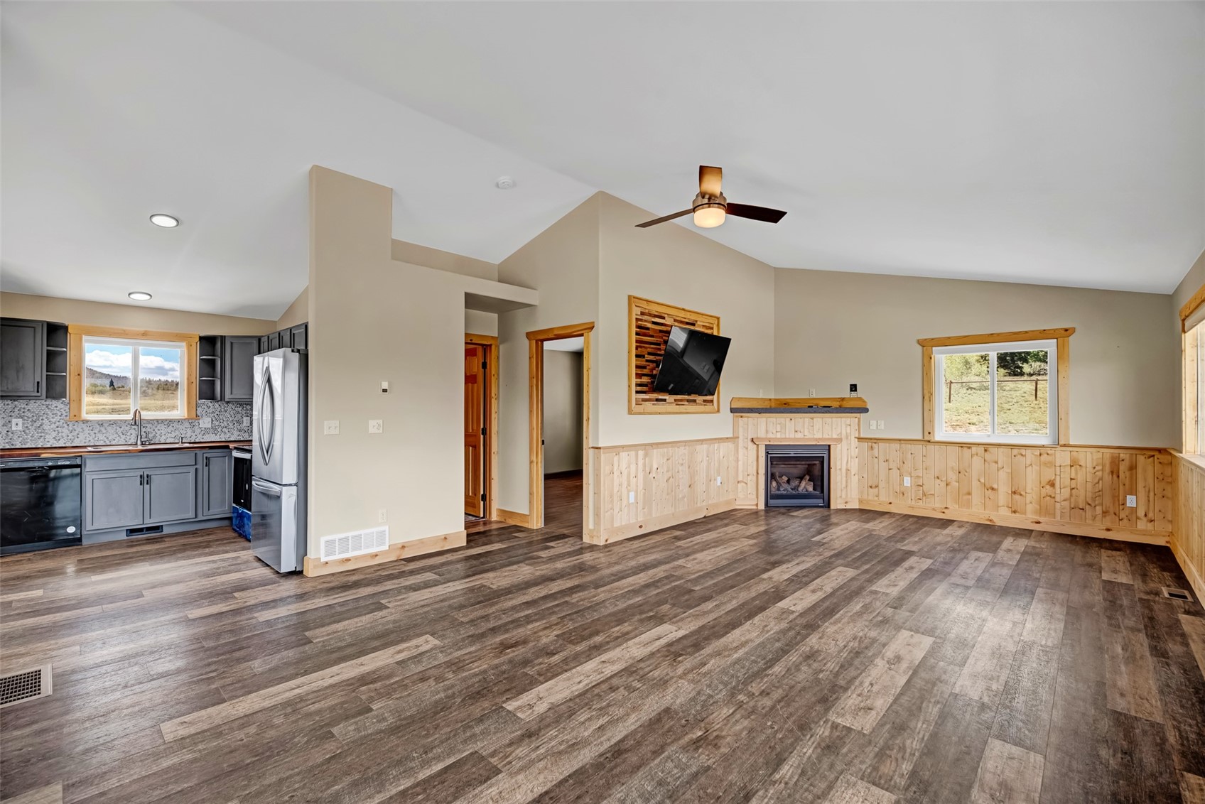 2491 Stagestop Road Jefferson, CO 80456 - Photo 21 of 43 a view of a kitchen with wooden floor and a window