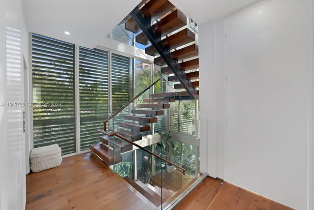 a view of entryway with wooden floor