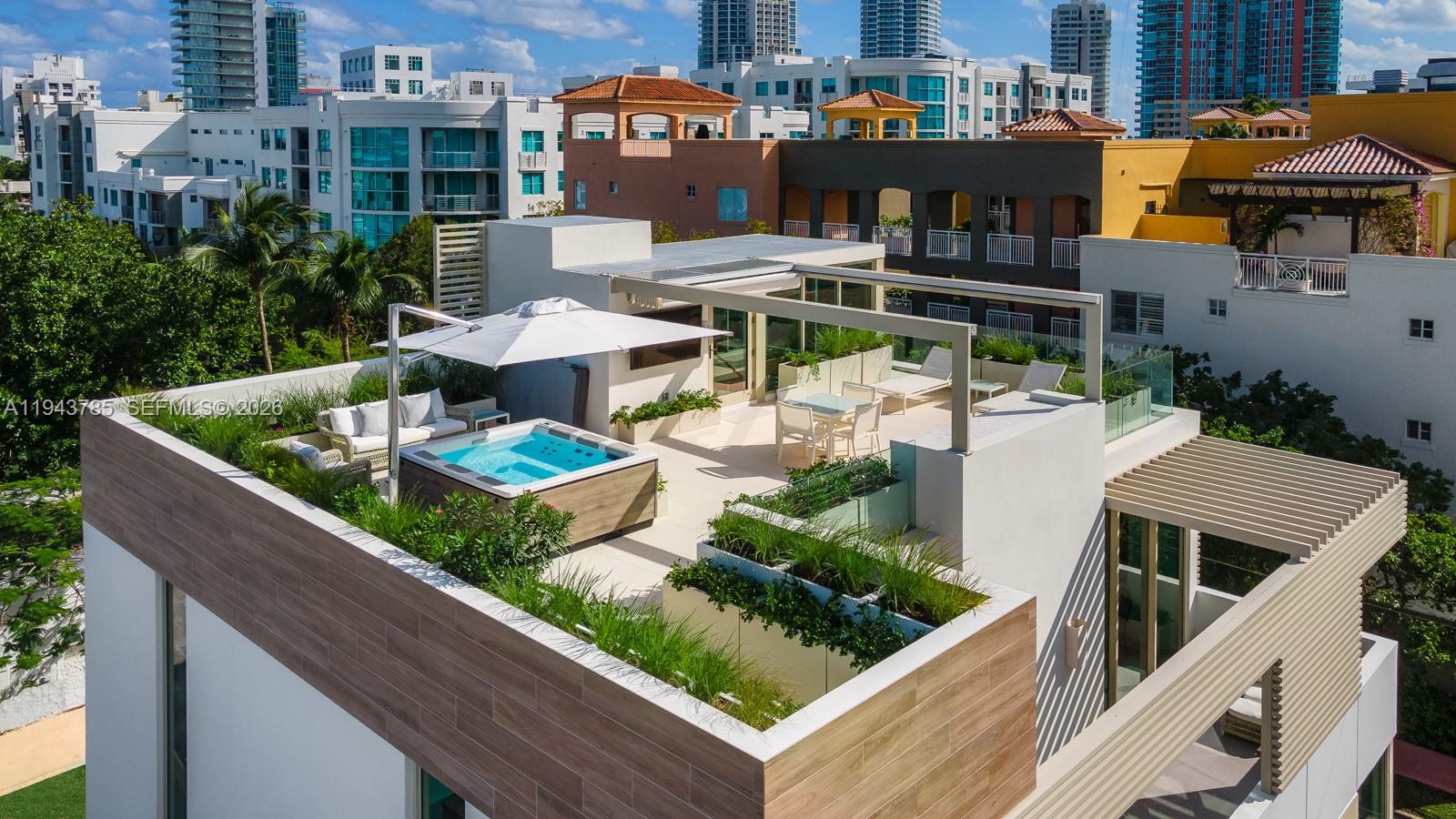 819 2nd Street Miami Beach, FL 33139 - Photo 29 of 32 a view of a chairs and table in the terrace