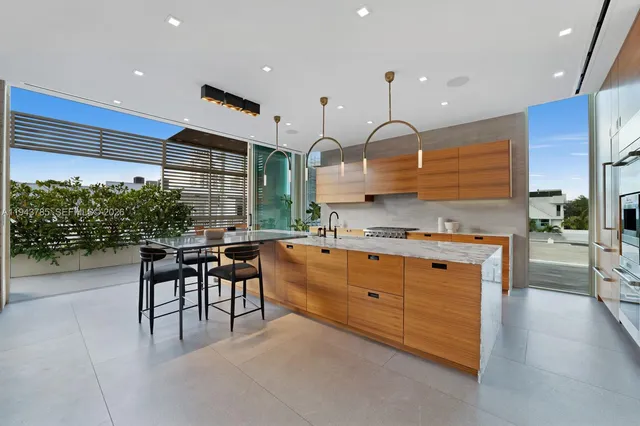 a kitchen with counter top space cabinets and outdoor view