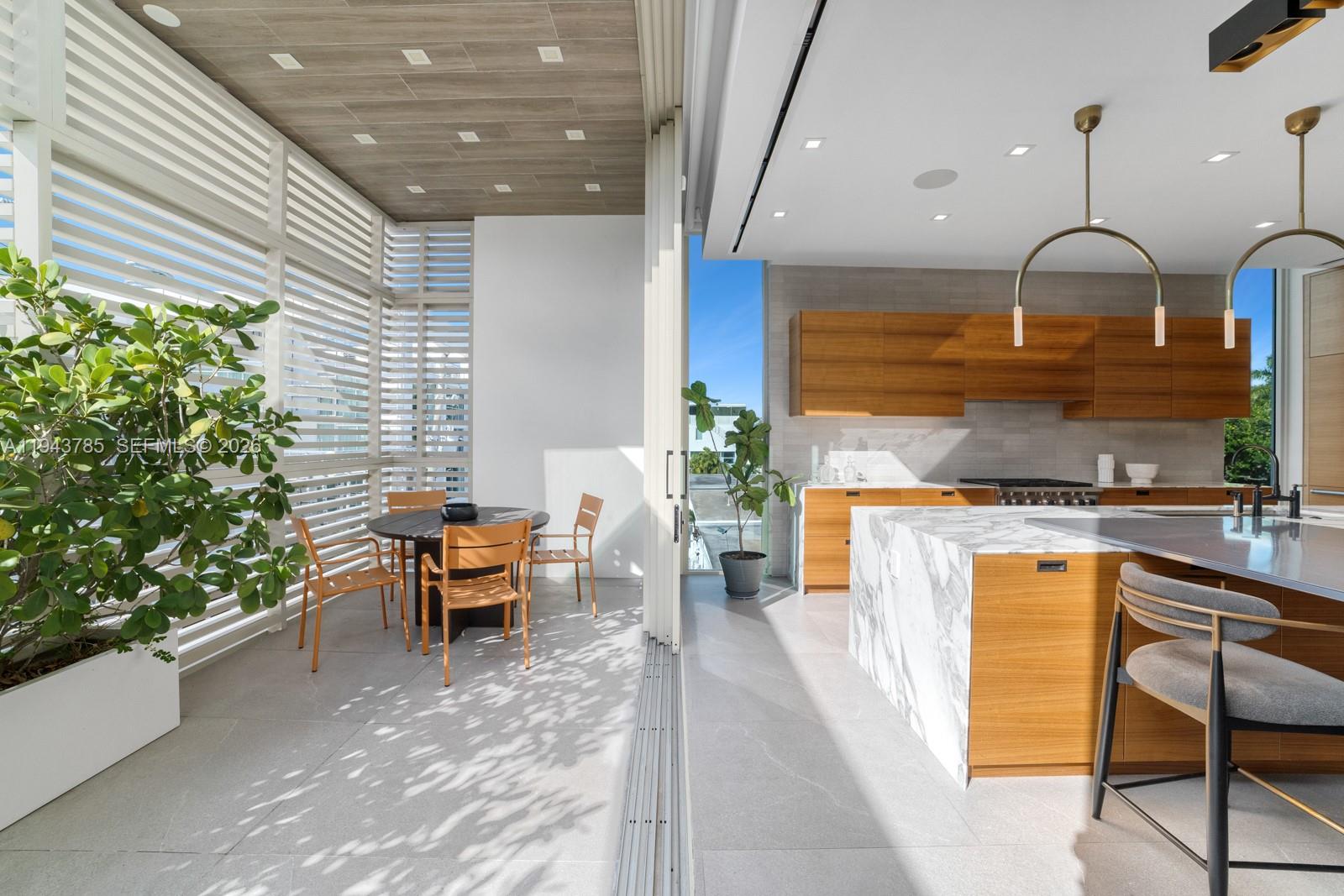 819 2nd Street Miami Beach, FL 33139 - Photo 9 of 32 a outdoor space with chairs