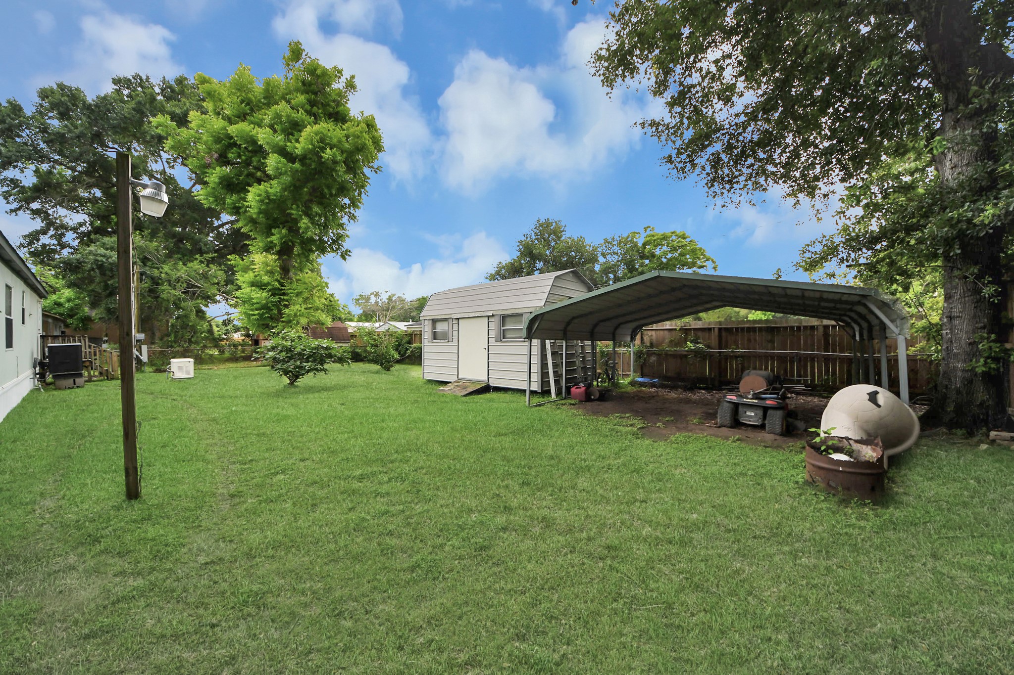 204 Edith Street Highlands, TX 77562 - Photo 26 of 33 a view of a house with backyard