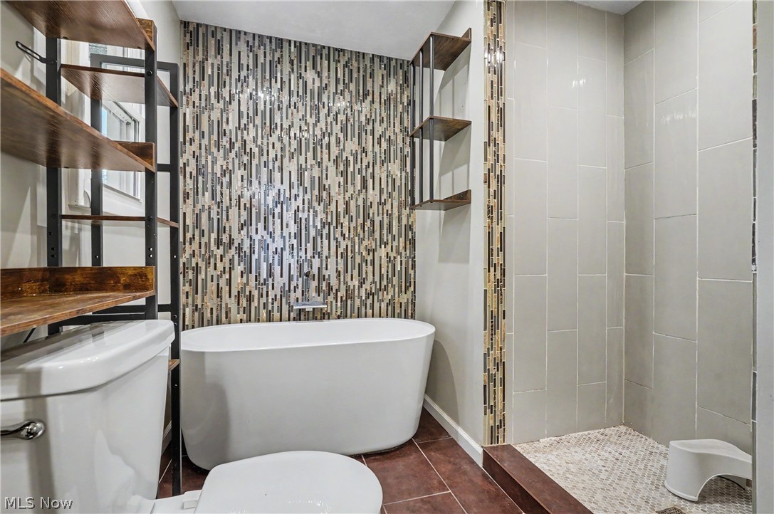 952 Ravenna Road Kent, OH 44240 - Photo 18 of 37 Bathroom with soaking tub and walk in shower.